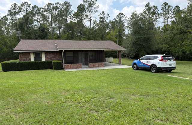 Newly renovated, new painted on large lot - mowing included in rent! photos photos