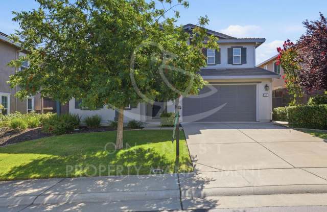 spacious 4-bedroom, 2.5-bathroom home in the desirable Whitney Ranch photos photos