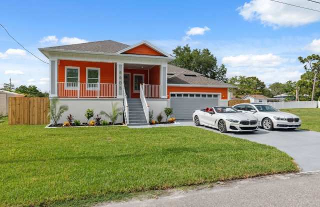 LEASE TO OWN - COASTAL LUXURY with GULF ACCESS - 3BR / 2BATHS / 2 GARAGE photos photos