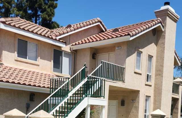 Gorgeous 2 bedroom newly renovated upstairs corner condo in gated community with pool & hill side views! photos photos