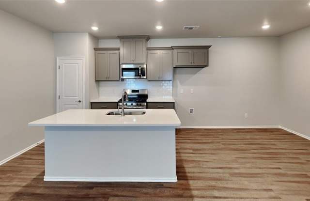 Luxury 3 Bedroom 2 Bathroom Townhome in Piedmont Schools- Neighborhood Park and Basketball Court Gallery 4