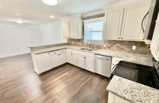 Spacious 4BR/3BA Brick Home with Bonus Mother-in-Law Suite on Geraldine Dr! photos photos