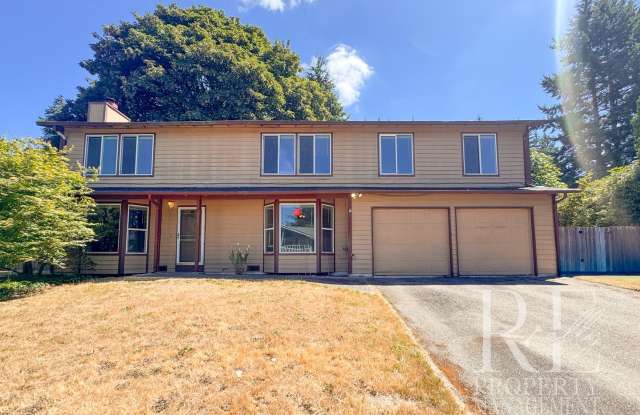 Cozy 4-Bedroom Home with Two Fireplaces, Fenced Backyard & 2-Car Garage photos photos