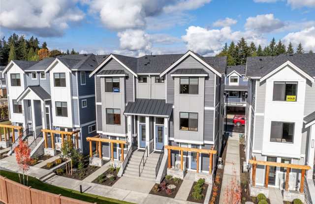 Stunning 4-Bedroom Townhome in Legacy Farms – Greenbelt Setting, A/C & 2-Car Garage Gallery 1