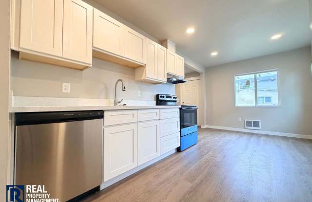 MOVE-IN SPECIAL! Completely Renovated 2 Bedroom Home Near PLU | New Kitchen & Stainless Appliances Gallery 4