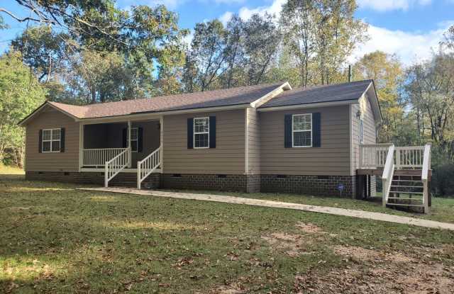 NEW LISTING! 3 Bedroom/ 2 Full Bath Home Located on Private Lot. 2 Minutes from Jordan Lake. Peaceful Living and Country Surroundings! - 8074 Moncure Pittsboro Road, Moncure, NC 27559