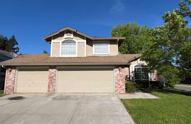 Stunning 4 Bedroom Corner Lot Home with Modern Renovation, 3-Car Garage and Covered Patio photos photos