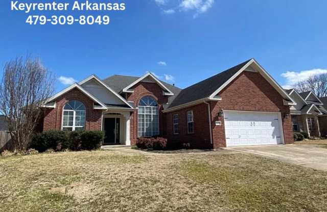 Bright & Spacious 4-Bedroom Home with Fireplace, 2-Car Garage & Fenced Backyard in Rogers! Gallery 1