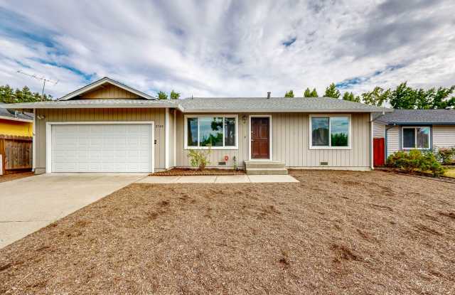 Bright 2 Bedroom, 1 Bathroom Single Family Home! Attached 2 Car Garage and Landscaping Included! photos photos