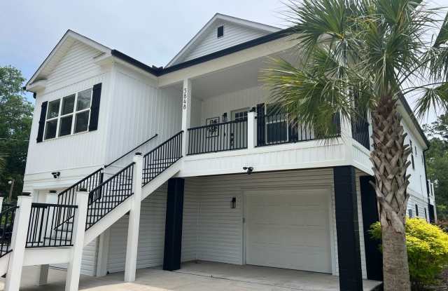 Stunning 3 Bedroom, 2.5 Bath Home off the Waterway, 2 Bonus Rooms, 3 Decks, and More! photos photos