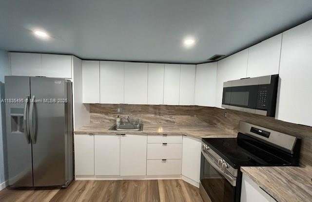 1475 NE 125th Ter photos photos