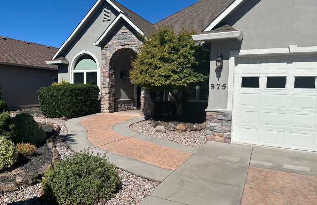 Located in the desirable Eagle Point Golf Course community, this 5 bedroom home offers both elegance and comfort. photos photos