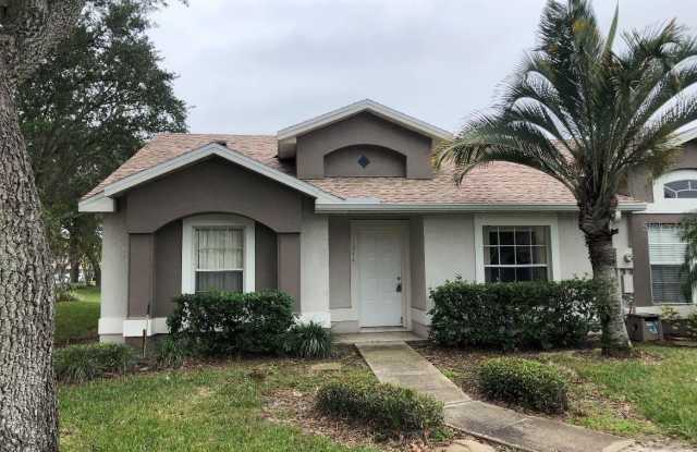 1244 BAREFOOT BAY DRIVE - 1244 Barefoot Bay Drive, Meadow Woods, FL 32824