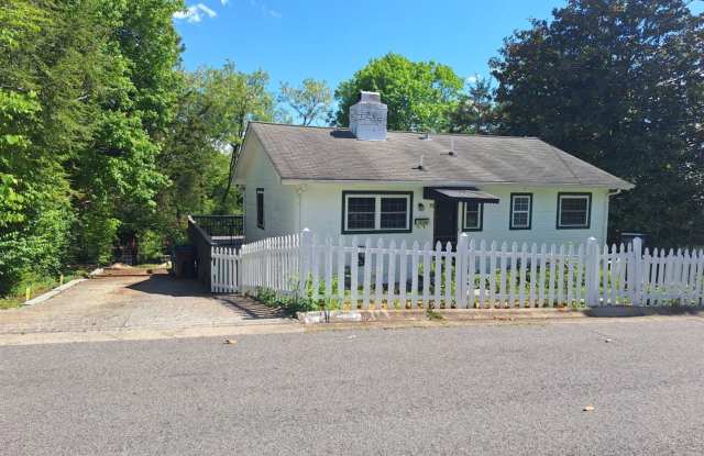 Cute white cottage with white picket fence & Huge deck off back door! photos photos