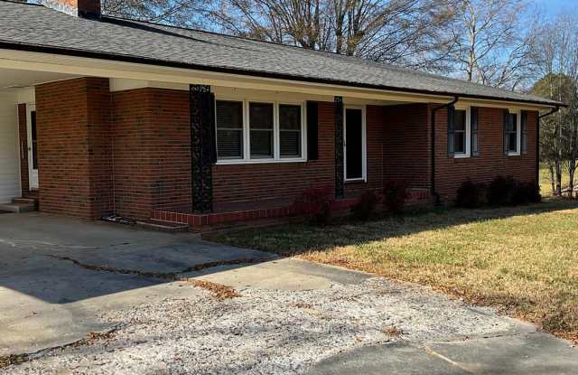 Brick Ranch Style home with 3 Bedrooms, 2.5 Baths, Full Unfinished Basement In Iron Station NC photos photos