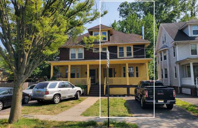Updated  freshly painted, half duplex with 3-bedroom (2 bonus rooms), off-street parking  in close proximity to NJ Transit - 404 West Milton Avenue, Rahway, NJ 07065