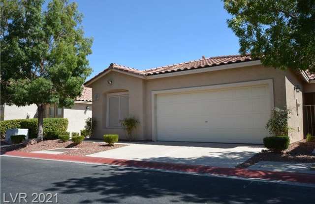 Charming Single-Story Townhome with Vaulted Ceilings in a Gated Northwest Community! photos photos