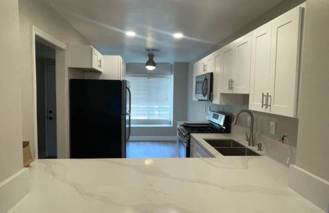 Updated 2 Bedroom, 2.5 Bath Condo Includes 1 Car Garage, 2 parking spots  Washer/ Dryer photos photos