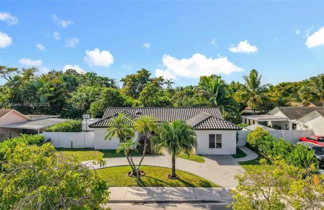 5874 NW 199th St - 5874 Northwest 199th Street, Country Club, FL 33015