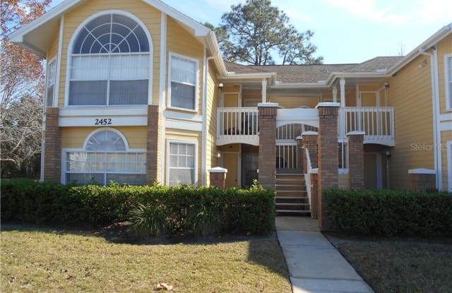 2452 SWEETWATER CLUB CIRCLE - 2452 Sweetwater Club Circle, Osceola County, FL 34746