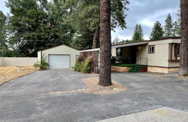 Affordable  Ideally Located 2 Bed 2 Bath Mead Home w/ Large Detached Garage/Shop! photos photos