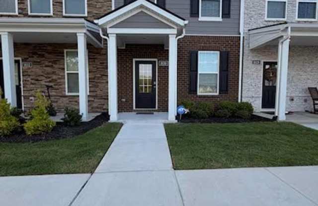FOR LEASE- Townhome Nestled on a quiet dead-end road, perfect for those seeking privacy and peaceful surroundings. photos photos