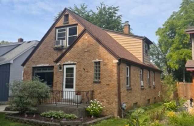 AVAILABLE SEPTEMBER 1: Updated 4-bedroom single family home on a quiet block- with 2 kitchens, 2 full bathrooms, basement space and MORE! photos photos