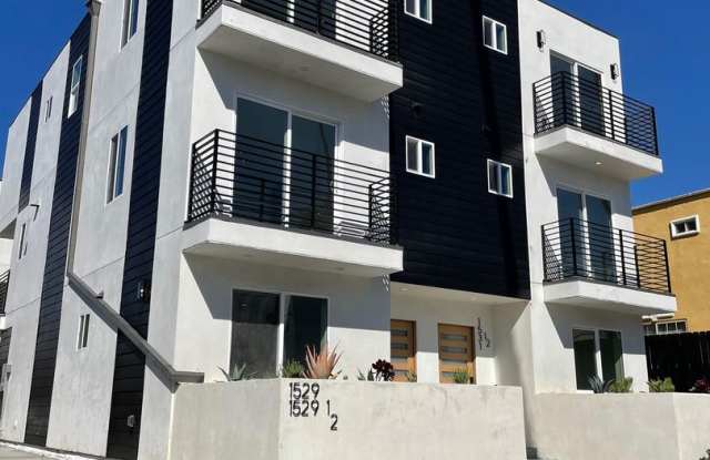 Spacious 4 Bedroom 3.5 Bath in Prime Thai Town Location! photos photos