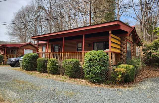 $1,100 - 2 Bedroom / 1 Bath Unfurnished Log Cabin Near Cherokee photos photos