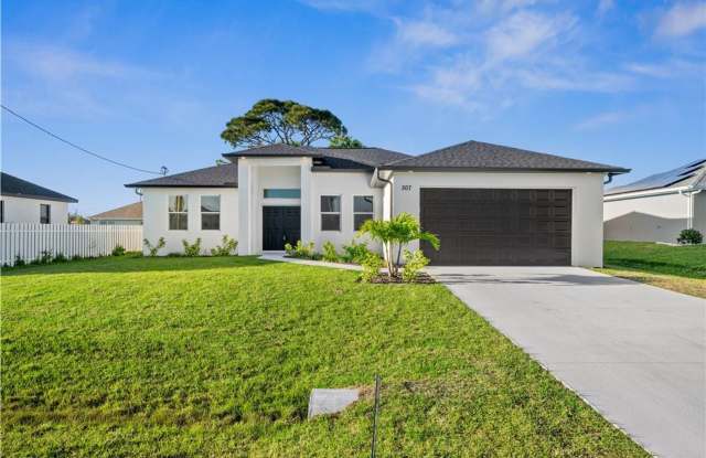 Stunning New Construction Home in Desirable Cape Coral Neighborhood photos photos