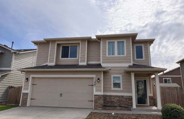 Move-in Ready with a fenced yard and Rec Center access! Gallery 1