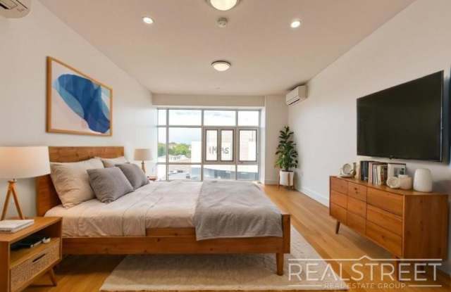 90-02 Queens Blvd photos photos