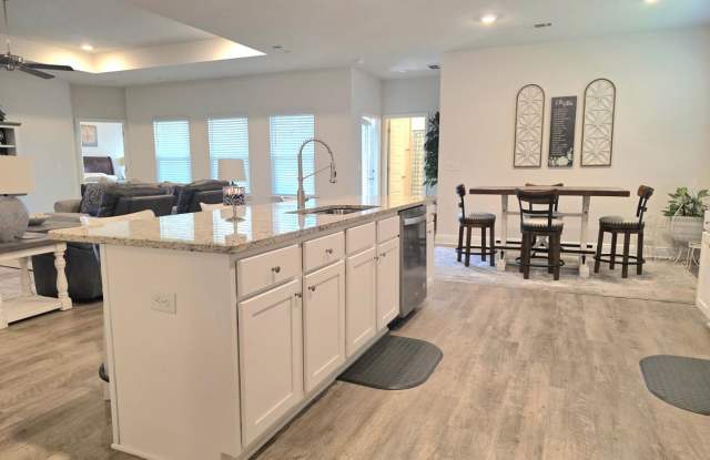 Welcome home to this stunning Milton gem on 1/2 Acre Lot! Gallery 4