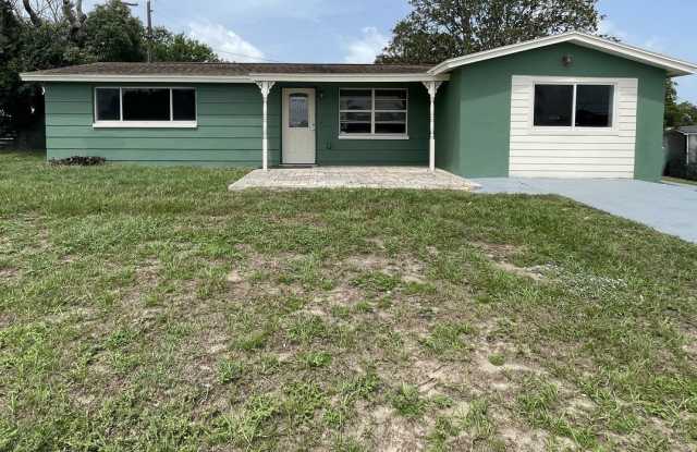 Cozy 3-Bedroom Home on a Corner Lot in Holiday, FL photos photos
