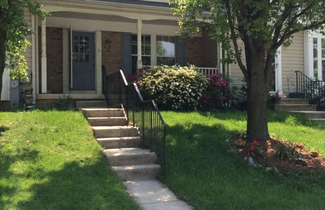 Spacious 2-Bedroom Townhome with Finished Basement  Prime Location photos photos