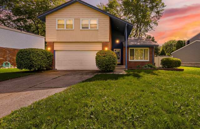 Spacious & Updated Novi Colonial | Vaulted Ceilings, Fireplace & Private Deck Gallery 1