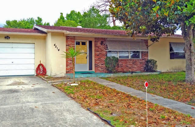 Spacious 2/2 home featuring neutral ceramic tile throughout within the heart of Spring Hill Gallery 3