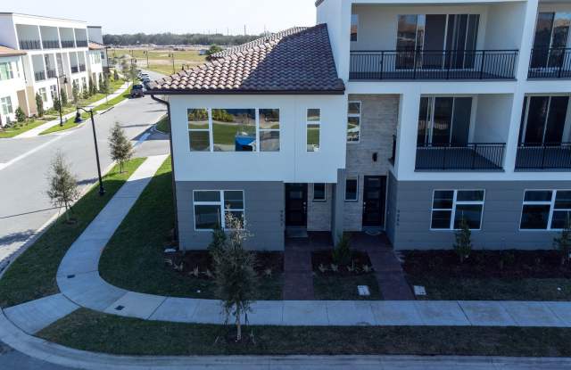 Stunning MOVE-IN READY LAKE VIEW TOWNHOME in. Exquisite 3 bedrooms, 2.5 bathrooms and 2 car garage in the exceptional gated community of Eagle Creek Gallery 2