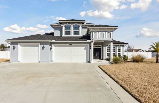 Spacious 5-Bedroom Home with Office, Den  Included Electric! photos photos