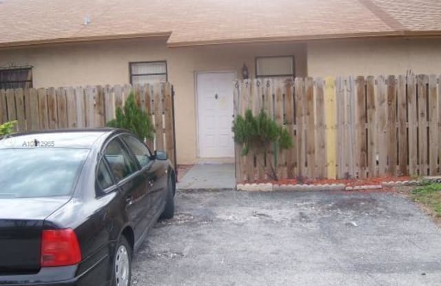6708 NW 189th St - 6708 Northwest 189th Street, Country Club, FL 33015
