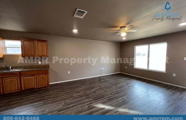 New Beginnings Start with AMRR –  Charming 3 Bedrooms, 2 Baths & Room to Make It Yours Gallery 3