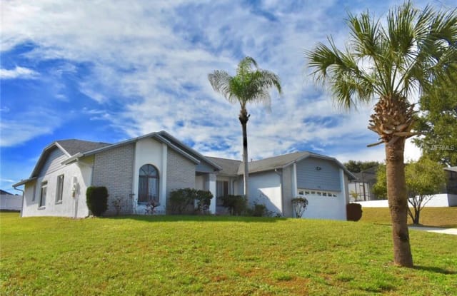 7704 INDIAN RIDGE TRAIL N - 7704 Indian Ridge Trail North, Four Corners, FL 34747
