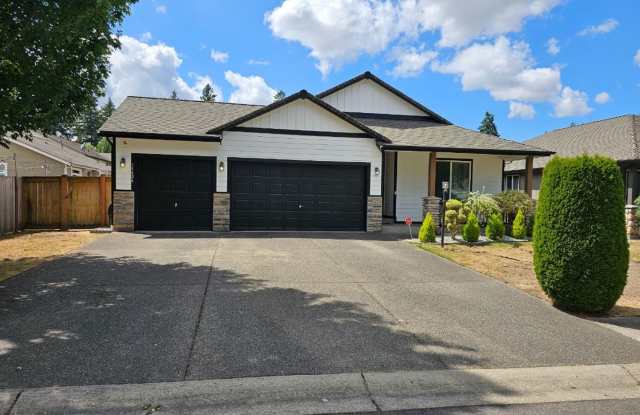 Spacious Tacoma Home with Gas Fireplace, 3-Car Garage & Covered Patio! photos photos