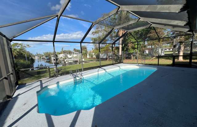 $2,495 ** Annual ** Custom, Renovated Pool Home **3 Bedroom / 2 Bath * Port Charlotte - 18522 Lake Worth Boulevard, Port Charlotte, FL 33948
