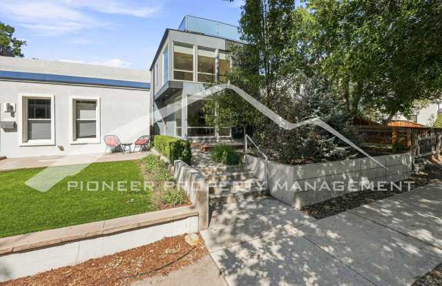 Lovely Single Family Home With Central AC, Rooftop Patio, and a 2 Car Garage! Gallery 1