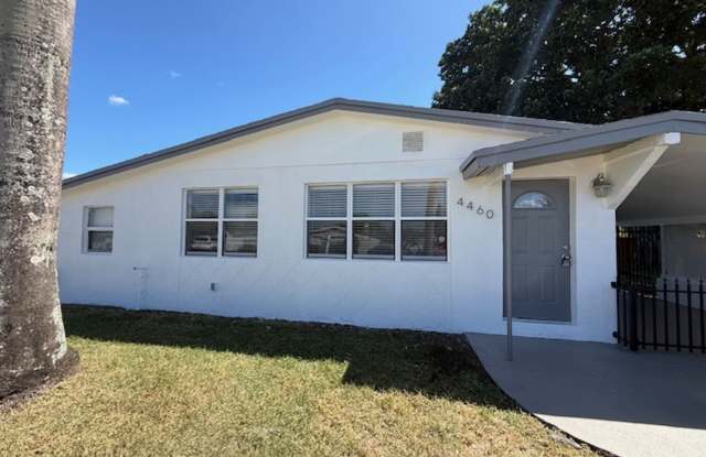 The perfect corner House with 3 beds 2 bath in Pompano Park! Huge backyard and $1,500 Sec Dep Special with approved credit! photos photos
