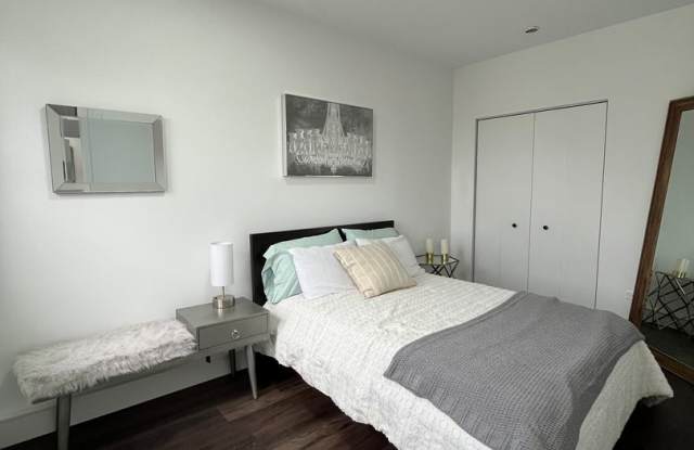 Modern 2-Bedroom Gem in the Heart of Andersonville | Separate Kitchen, In-Unit Laundry  Tons of Natural Light photos photos