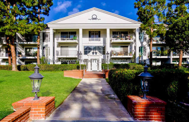 Updated Newport Beach Condo in Gated Versailles Community with Resort-Style Amenities photos photos