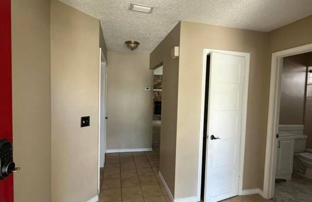 Cul-de-sac location with a fenced in yard. Gallery 4