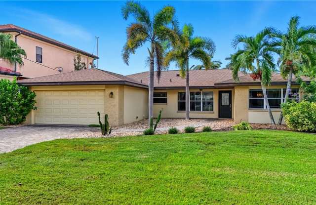 3BR/2BA Cape Coral Waterfront Home with Private Pool, Boat Lifts & 2-Car Garage — $2,800/mo photos photos